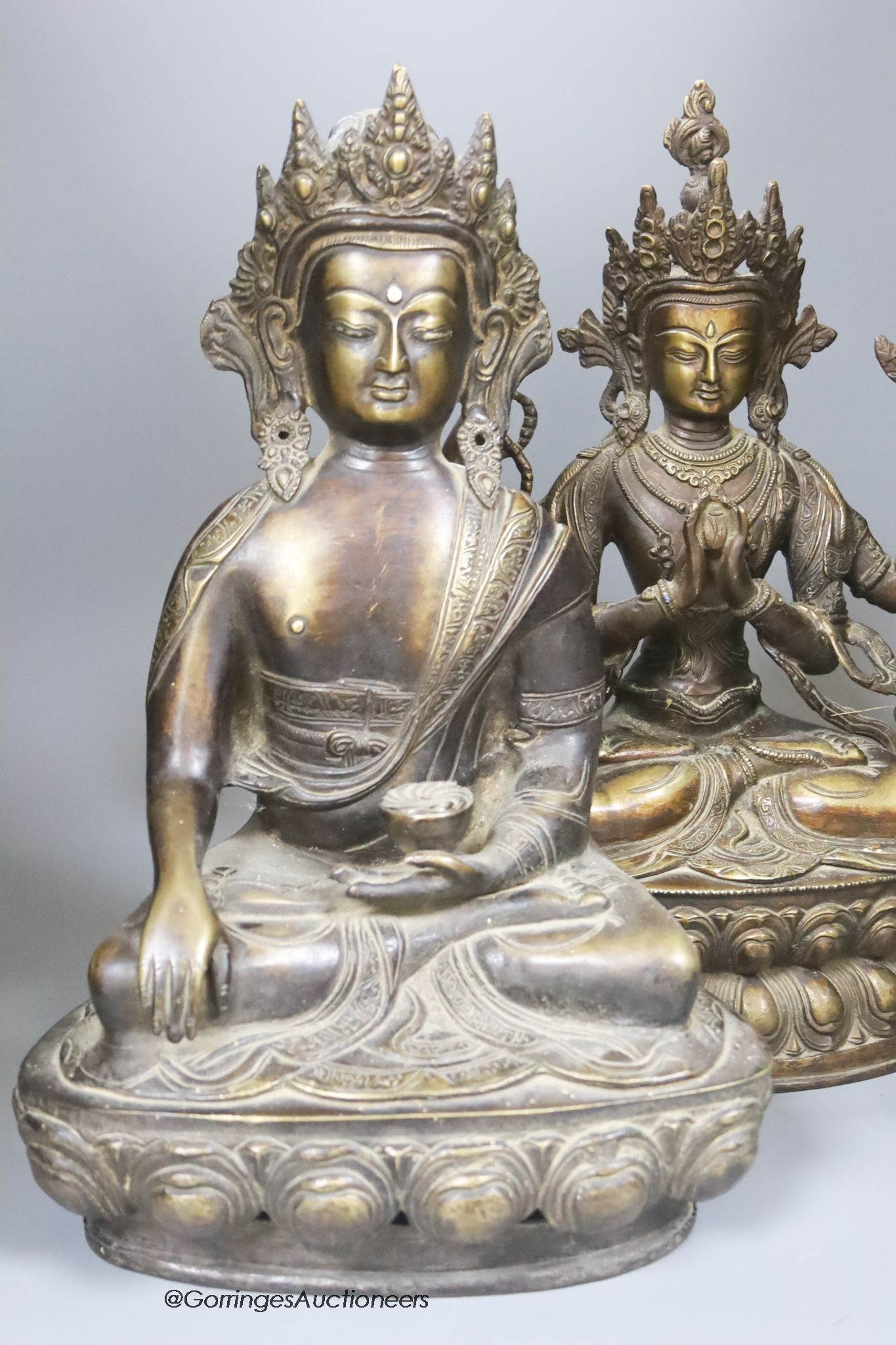 Two Asian bronze seated figures of Bodhisattvas, 37 cm high